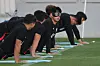 Korean national team players including Son Heung-min, center, stretch during a training session at Al Egla Training Site 5 in Doha, Qatar, on Friday. Korea will play their second match against Ghana on Nov. 28. [AP/YONHAP]