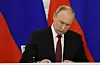 Russian President Vladimir Putin attends a ceremony to sign the treaties for four regions of Ukraine to join Russia at the Kremlin in Moscow on Friday. The signing of the treaties followed the completion of the Kremlin-orchestrated referenda. [AP/YONHAP]