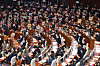 Ruling Democratic Party lawmakers cheer while the People Power Party members shout out their protests as the National Assembly passes a controversial bill Thursday revising the Corruption Investigation Office for High-ranking Officials (CIO) law to remove the veto power of the main opposition party in the process of selecting the CIO chief. [YONHAP]