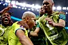 Brazil's Richarlison, center, celebrates scoring the opening goals of the World Cup group G football match between Brazil and Serbia, at the the Lusail Stadium in Lusail, Qatar on Thursday. Brazil beat Serbia 2-0 with Richarlison scoring both goals in the second half of the match. [REUTERS/YONHAP]
