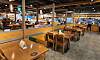 A buffet restaurant sits nearly empty in Seoul after resuming operations in early October, after being closed for two months. [YONHAP]