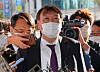 In this file photo, Prosecutor General Yoon Seok-youl enters the Daejeon District Prosecutors' Office to meet with prosecutors on Oct. 29, 2020. He resumed the regional tour of prosecutorial offices after eight months.  [YONHAP]