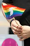 A participant holds a rainbow flag at the 2021 International Day Against Homophobia, Biphobia, Interphobia & Transphobia in Sinchon, western Seoul, on May 22. The event was held under the slogan ″We are here″ and urged the National Assembly to pass an anti-discrimination law this year. [NEWS1]