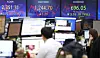 A screen in Hana Bank's trading room in central Seoul shows stock and foreign exchange markets close on Tuesday. [YONHAP]