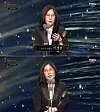 Producer Kwak Sin-ae, CEO of the production company Barunson E&M, accepting an award on behalf of director Bong Joon-ho for his Oscar-winning film 'Parasite' at 2020 Daejong Film Awards. [SCREEN CAPTURE]