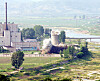 A cooling tower at North Korea's Yongbyon nuclear reactor is being demolished on June 27, 2008. [YONHAP]