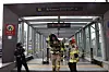 Firefighters emerge from an exit of Heukseok Station in Dongjak District, eastern Seoul, on Monday when the subway’s platform was restricted due to smoke. The smoke, the cause of which has yet to be identified, filled the station at around 4:42 p.m. on the same day. Subway line No.9 did not make a stop at the station as a safety measure. [YONHAP]