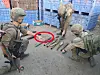 A photo of weapons confiscated by the Israel Defense Forces (IDF) shows what appears to be a North Korean F-7 rocket, circled in red. The photo is a screen grab from the IDF's website. [SCREEN CAPTURE]