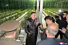 North Korean leader Kim Jong-un speaks to party officials as he attends a ceremony to mark the completion of a greenhouse farm in the country's eastern province on the occasion of the 77th founding anniversary of the ruling Workers' Party of Korea on Monday. [YONHAP]