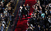 The cast of film “Believer 2” walks down the red carpet for the Busan International Film Festival’s opening ceremony held at the Busan Cinema Center in Haeundae District on Oct. 4, 2023. [YONHAP]