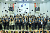 Students that graduated from the INHA-BEU Dual Degree Program throw their graduation caps during the program's first graduation ceremony. [INHA UNIVERSITY]