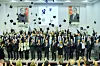 Students that graduated from the INHA-BEU Dual Degree Program throw their graduation caps during the program's first graduation ceremony. [INHA UNIVERSITY]