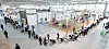 Passengers wait in long lines to check in at the boarding area at Terminal 1 of Incheon International Airport on Sunday. Since the Korean government did away with a mandatory seven-day quarantine for vaccinated arrivals from other countries starting March 21, international travelers have drastically increased, according to travel agencies. [YONHAP]