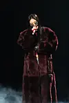 Jennie sings during her solo concert, ″The Ruby Experience,″ at the Inspire Arena in Incheon on March 15. [ODD ATELIER]