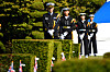 South Korean Navy service members stand in silent vigil during a ceremony to mark United Nations Day at the UN Memorial Cemetery in Korea in Busan on Thursday. United Nations Day is observed on Oct. 24 to mark the anniversary of the day that the United Nations Charter entered into force in 1945. [NEWS1]