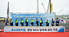 Posco Future M President Kim Jun-hyung, fifth from left, Kim Ik-hyeon, vice president at Samsung SDI, and other executives turn a shovel during a groundbreaking ceremony for the construction of a high-nickel cathode plant in Gwangyang, South Jeolla, on Thursday. [POSCO FUTURE M]