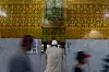 A Muslim man offers prayers at Mahim Dargah, a Muslim shrine in Mumbai on April 2. [AP/RAFIQ MAQBOOL]