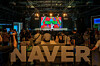 Visitors watch a performance at Naver’s pavilion inside the “Festival Station” of the 2025 World Expo in Osaka, Japan, on July 10. [NAVER CLOUD]