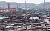 Containers are stacked at the port in Busan on Sept. 21. Korea may suffer a trade deficit of $48 billion this year, a record, according to a report by the Korea Economic Research Institute (KERI) on Sunday. [NEWS1]