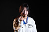 Choi Ga-on, gold medalist in the women’s snowboard halfpipe, poses for a photo with her gold medal at the Samsung House at Palazzo Serbelloni in Milan on Feb. 14. [KIM JONG-HO]