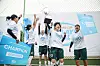Members of the DIP FC futsal team lift the The Player: Futsal Queens Cup at the S-Build Futsal Park in Suwon, Gyeonggi on Sunday in a photo released by Puma on Wednesday. DIP FC emerged victorious in the inaugural 24-team competition sponsored by Puma and Musinsa to promote women's football in Korea. [PUMA]