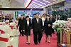 North Korean leader Kim Jong-un, center, attends a banquet celebrating the 75th anniversary of the founding of the Korean People's Army's with his daughter and wife on Tuesday. [KOREAN CENTRAL NEWS AGENCY]