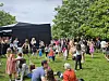 Visitors try out K-pop choreography during the “Pavilion Family Day” event at the Serpentine Pavilion on Sunday. [KOREAN CULTURAL CENTRE UK]