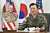 Gen. Won In-choul, right, chairman of South Korea’s Joint Chiefs of Staff, held talks over the phone on the transfer of wartime operational control with his U.S. counterpart, Gen. Mark Milley, on Tuesday. [JOINT CHIEFS OF STAFF]