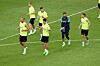 Tottenham players, including Son Heung-min, front right, and Harry Kane, front left, warm up during a training session at Seoul World Cup Stadium in Mapo District, western Seoul on Monday. [NEWS1]