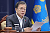 President Moon Jae-in hosts a cabinet meeting via videoconference call from the Blue House on Tuesday.  [YONHAP]