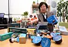 An official of the Busan branch of the Korea Consumer Agency discloses the results of the watchdog's evaluation of 15 decaffeinated coffee capsules in Sejong on March 6. [YONHAP]