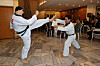 Philippe Lefort, ambassador of France to Korea, left, shows off his Taekwondo skills during the Culture Communication Forum 2023, held at the Embassy of France in Seodaemun District, western Seoul. [YONHAP]