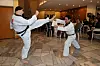 Philippe Lefort, ambassador of France to Korea, left, shows off his Taekwondo skills during the Culture Communication Forum 2023, held at the Embassy of France in Seodaemun District, western Seoul. [YONHAP]