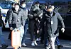 A 32-year-old man, who is suspected of murdering a taxi driver, as well as his ex-girlfriend, enters the Goyang branch of the Uijeongbu District Court to attend a hearing on Wednesday. [YONHAP]