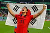 Hwang Hee-chan celebrates at the end of the Qatar 2022 World Cup Group H match between Korea and Portugal at the Education City Stadium in Al-Rayyan, west of Doha on Friday. Hwang's goal eventually became the winning goal as Korea won the match 2-1 and qualified for the round of 16. [AFP/YONHAP]