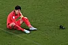 Son Heung-min reacts at the end of the match after beating Portugal 2-1 and qualifying for the knockout stages on Friday evening at the Education City Stadium in Al-Rayyan, west of Doha. [AFP/YONHAP]