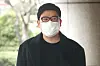 Singer Bobby Chung attends his second trial at the Seoul Southern District Court in Mapo District, western Seoul, on Thursday. [YONHAP]