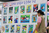 Paintings wishing for the reunification of the Korean Peninsula are on display on July 13, 2025, in Seoul at a culture event marking the North Korean Defectors' Day. [YONHAP]
