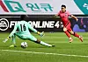 Lee Dong-jun kicks the ball past the goalkeeper, slotting in the winning goal during Korea's pre-Olympic friendly against Ghana at Jeju World Cup Stadium in Seogwipo, Jeju on Tuesday. [YONHAP]