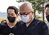 Composer and producer Don Spike enters the Seoul Northern District Court in Dobong District, Northern Seoul, last September for a warrant review requested by the police. [YONHAP]