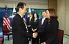 South Korean Prime Minister Han Duck-soo and U.S. Vice President Kamala Harris shake hands during a meeting at a Tokyo hotel on Tuesday. [YONHAP]