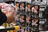 This undated file photo shows a customer choosing Samyang Foods' Buldak Bokkeummyeon product at a store in Seoul. [YONHAP]