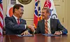 LG Chem CEO Shin Hak-cheol, left, and Tennessee Governor Bill Lee shake hands after signing an agreement to build a cathode manufacturing plant in Clarksville, Tennessee, on Tuesday. [LG CHEM]