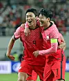 Cho Gue-sung, left, celebrates with Son Heung-min after scoring Korea's third goal in a game against Egypt at Seoul World Cup Stadium in Mapo District, western Seoul. [NEWS1]