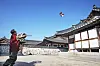 Rhee flies a bangpae kite in Namsangol Hanok Village. [PARK SANG-MOON]