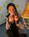 First lady Kim Keon Hee on Tuesday, local time, holds two puppies at an animal protection facility in Amsterdam she visited during President Yoon Suk Yeol's five-day state visit to the Netherlands. [JOINT PRESS CORPS]
