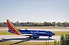 A Southwest Airlines airplane prepares for takeoff at Dallas Love Field airport in Dallas, on Nov. 15, 2024. The Transportation Department said in a lawsuit that two of the airline’s routes were consistently delayed in violation of federal rules. [Desiree Rios/The New York Times]