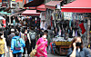 Namdaemun Market in Jung-district, central Seoul, is filled with grocery shoppers Thursday, two days after emergency disaster funding was distributed by the central government. Relief grants can only be used in traditional markets and local businesses. [YONHAP]