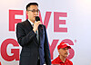 Hanwha Hotels & Resorts Vice President Kim Dong-seon speaks at a brand conference for U.S. burger chain Five Guys in Seocho District, southern Seoul on June 22, 2023. [NEWS1]