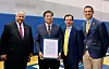 From left: U.S. Secretary of the Navy Carlos Del Toro; Michigan Gov. Gretchen Whitmer; Shin Jong-gye, the technology adviser of HD KSOE; and Jonathan Page, naval engineering professor at the University of Michigan, pose for a photo during a memorandum of understanding signing ceremony held at Macomb Community College in Michigan on Monday. [HD HYUNDAI]